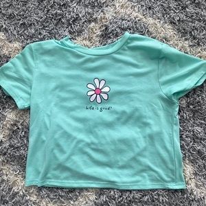 NEVER WORN “life is good?” casual cropped tee. beautiful color with cute flower.